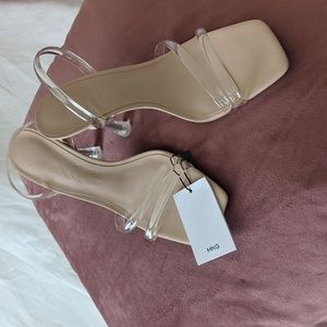 Clear sling back heels